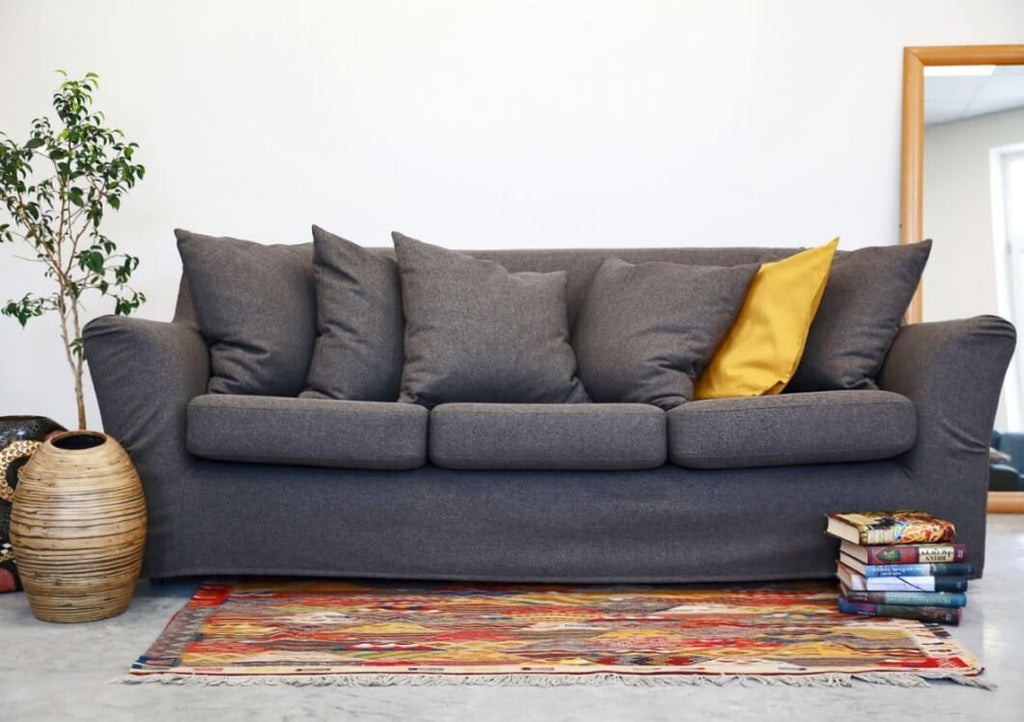 Bohemian interior with IKEA Klippan sofa cover